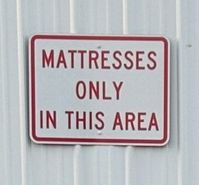 sign - mattresses only area