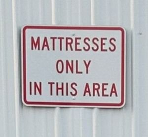 sign - mattresses only area