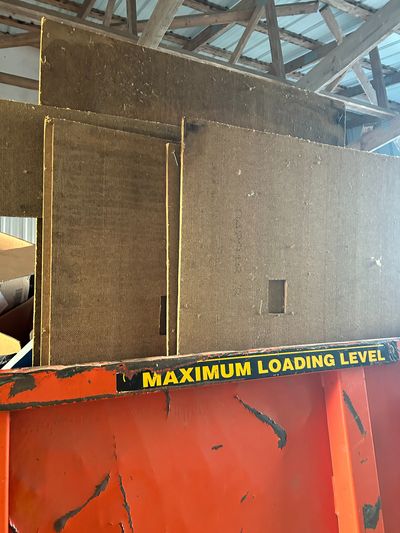 dumpster over loaded